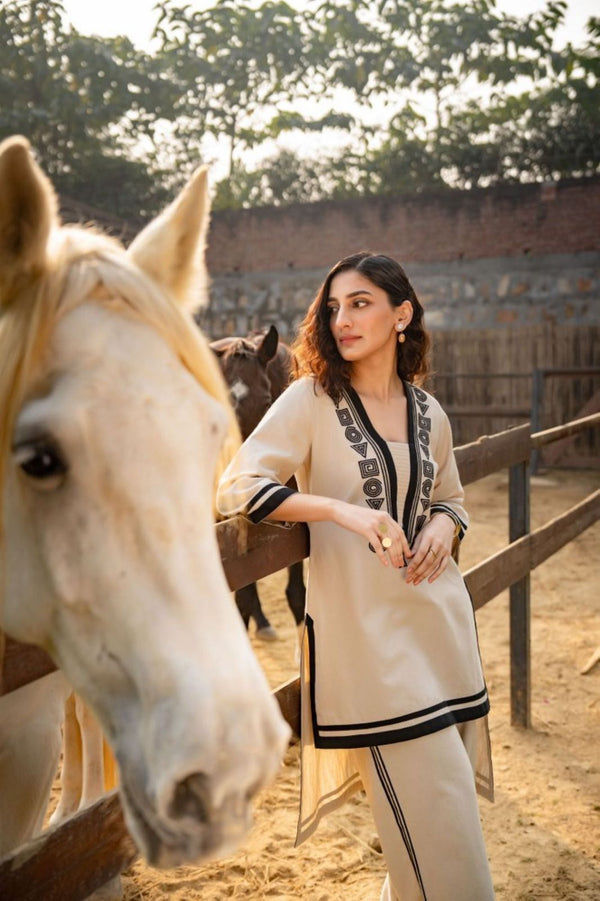 Beige V-Neck Co-Ord SetBlack Thread Embroidery & Border Detailing Perfect for All Occasions